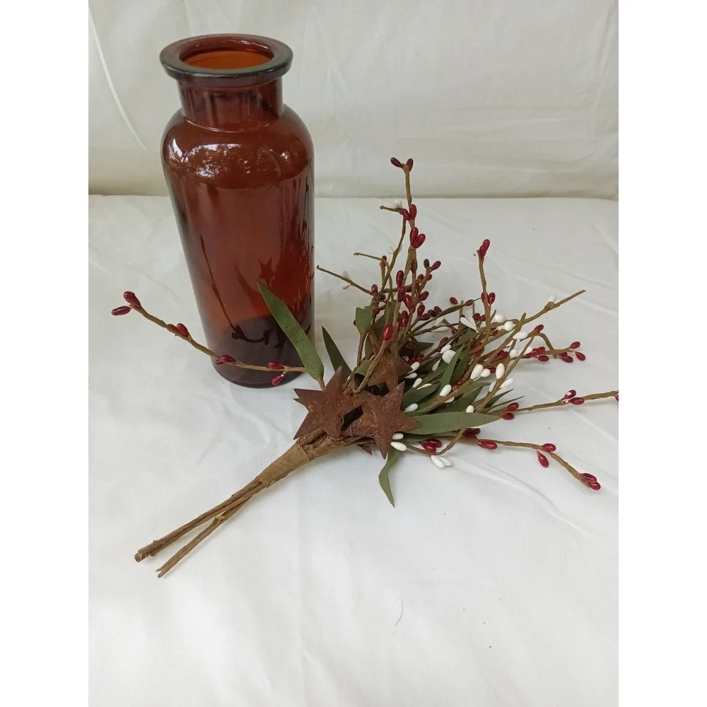 Amber apothecary bottle with red white pip berry pic w rusty stars